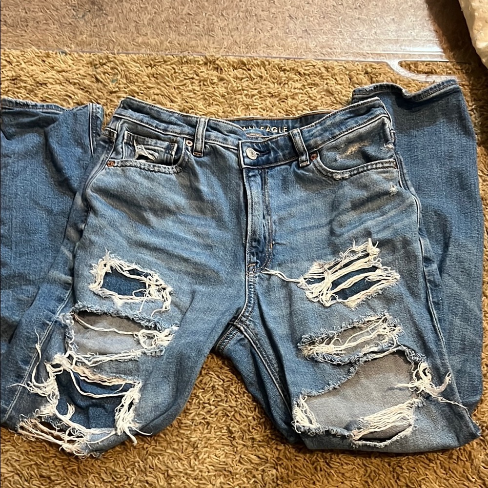 American Eagle Distressed Blue Jeans cross over waist